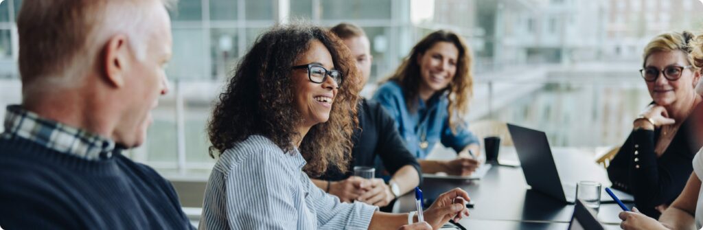 Group meeting in modern office setting.