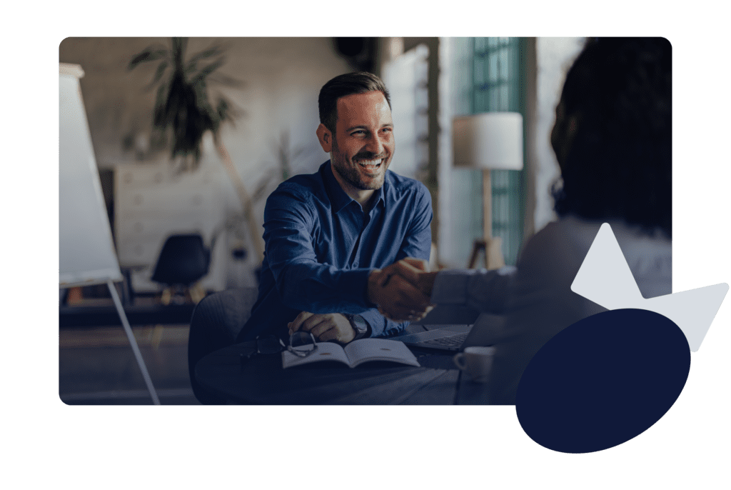 Young professional shaking hand of woman