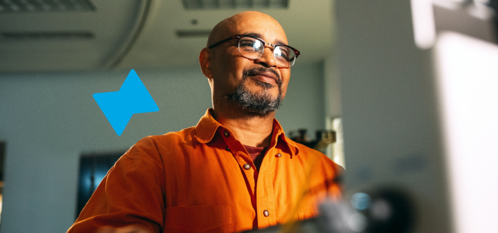 A person looking at a computer screen and reviewing a New York residential lease agreement.